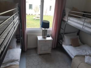 Postel nebo postele na pokoji v ubytování Råda Hotel