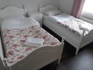 Postel nebo postele na pokoji v ubytování Råda Hotel