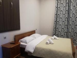 Postelja oz. postelje v sobi nastanitve Guest House Kakheti