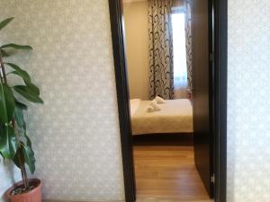 Postelja oz. postelje v sobi nastanitve Guest House Kakheti