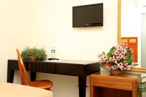 TV a/nebo společenská místnost v ubytování Hotel Rembia
