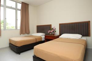 Postel nebo postele na pokoji v ubytování Hotel Rembia