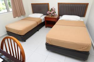 Postel nebo postele na pokoji v ubytování Hotel Rembia