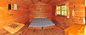 Postel nebo postele na pokoji v ubytování Campsite Leiputrija