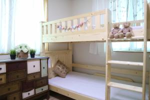 Krevet ili kreveti na sprat u jedinici u okviru objekta Mr. Kim Guesthouse