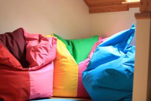 A bed or beds in a room at Das Schäferhäuschen - Leitenbauer Schäferei