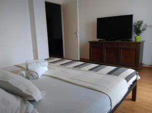 Postel nebo postele na pokoji v ubytování Apartmani Deniz
