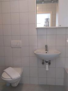 Koupelna v ubytování Apartmani Deniz + 11 fotografií