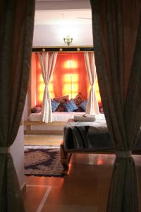 Letto o letti in una camera di Shanti Home