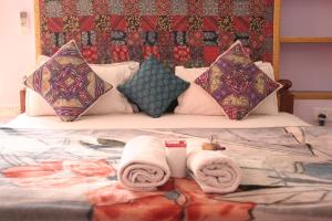 Letto o letti in una camera di Shanti Home