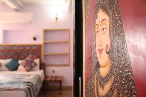 Letto o letti in una camera di Shanti Home