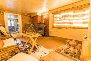 Posezení v ubytování Magnat Inn Sauna & Relax