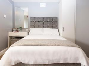 Кровать или кровати в номере The Rusty Mackerel