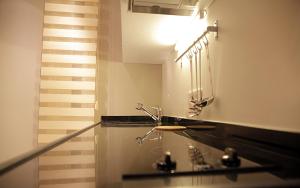 A bathroom at Frida Suites Még 37 kép