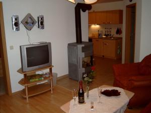 A television and/or entertainment centre at FH Alfred