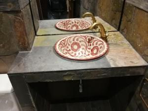 two pizzas sitting on top of a counter at BAVIECA-MARIMEDRANO 12 in Medinaceli