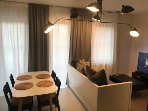 Posedenie v ubytovaní Apartament Bulwary Warty