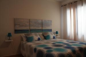 A bed or beds in a room at mirador del roque 2