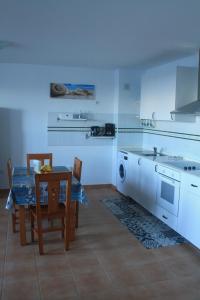 A kitchen or kitchenette at mirador del roque 2