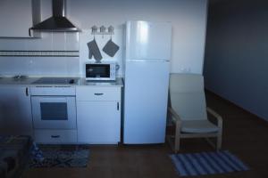 A kitchen or kitchenette at mirador del roque 2