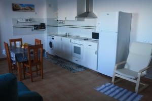 A kitchen or kitchenette at mirador del roque 2
