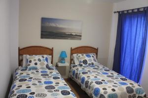 A bed or beds in a room at mirador del roque 2