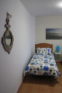 A bed or beds in a room at mirador del roque 2
