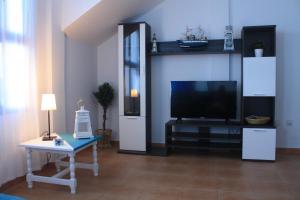 A television and/or entertainment centre at mirador del roque 2