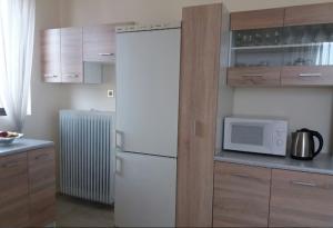 Kép Comfortable 4th fl flat ideal for up to 8 people szállásáról Pírgoszban a galériában Még 18 kép