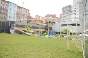 a soccer field with a goal in a city at Flat209 Veredas Rio Quente Particular in Rio Quente