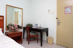 Postel nebo postele na pokoji v ubytování Hotel Rembia