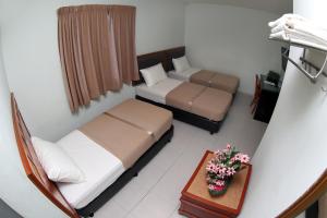 Postel nebo postele na pokoji v ubytování Hotel Rembia