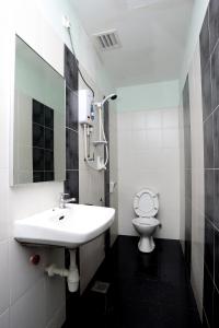 Koupelna v ubytování Hotel Rembia
