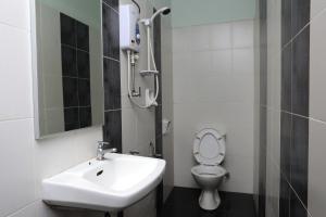 Koupelna v ubytování Hotel Rembia