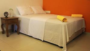 Ένα ή περισσότερα κρεβάτια σε δωμάτιο στο Kannur Beach view Homestay