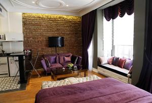 A television and/or entertainment centre at Frida Suites