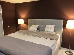 Postel nebo postele na pokoji v ubytování Villas Opal Anfi Tauro + 37 fotografií