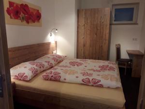 Posteľ alebo postele v izbe v ubytovaní Ferienwohnung Eiterer