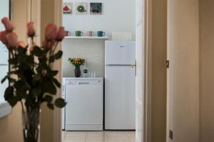 O bucătărie sau chicinetă la Marbel - Casa vacanze