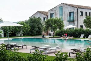 Bazén v ubytování Ramo d'Aria Etna Boutique Hotel nebo v jeho okolí