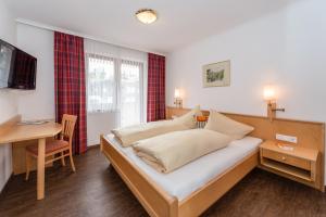 Postel nebo postele na pokoji v ubytování Pension Niederreiter