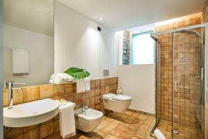 Koupelna v ubytování Ramo d'Aria Etna Boutique Hotel
