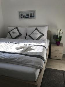 Posteľ alebo postele v izbe v ubytovaní Panorama Apartments