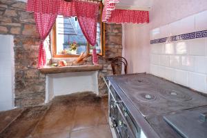Kuchyň nebo kuchyňský kout v ubytování Rural Apartment Carolina