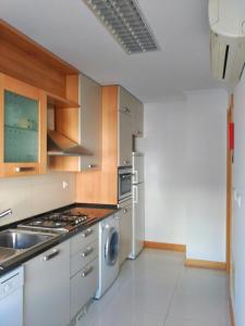 Кухня или мини-кухня в Apartamento Real
