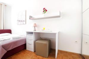 Postel nebo postele na pokoji v ubytování Apartment Meri