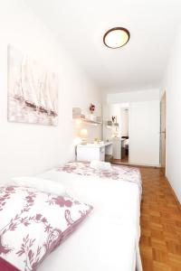 Postel nebo postele na pokoji v ubytování Apartment Meri
