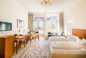 Postel nebo postele na pokoji v ubytování Hotel Brandies an der Messe
