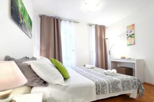 Postel nebo postele na pokoji v ubytování Apartment Meri