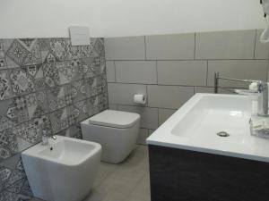 Een badkamer bij Le vie del Centro